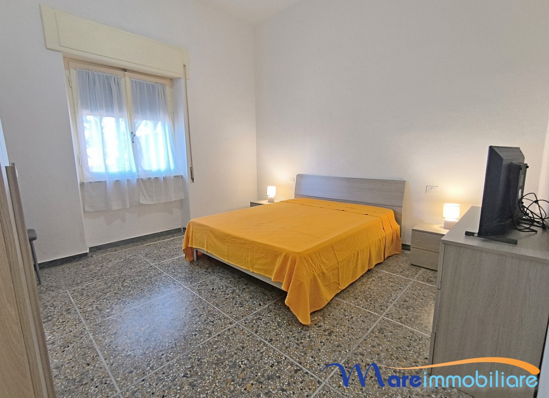 Trilocale con due camere da letto e posto auto
