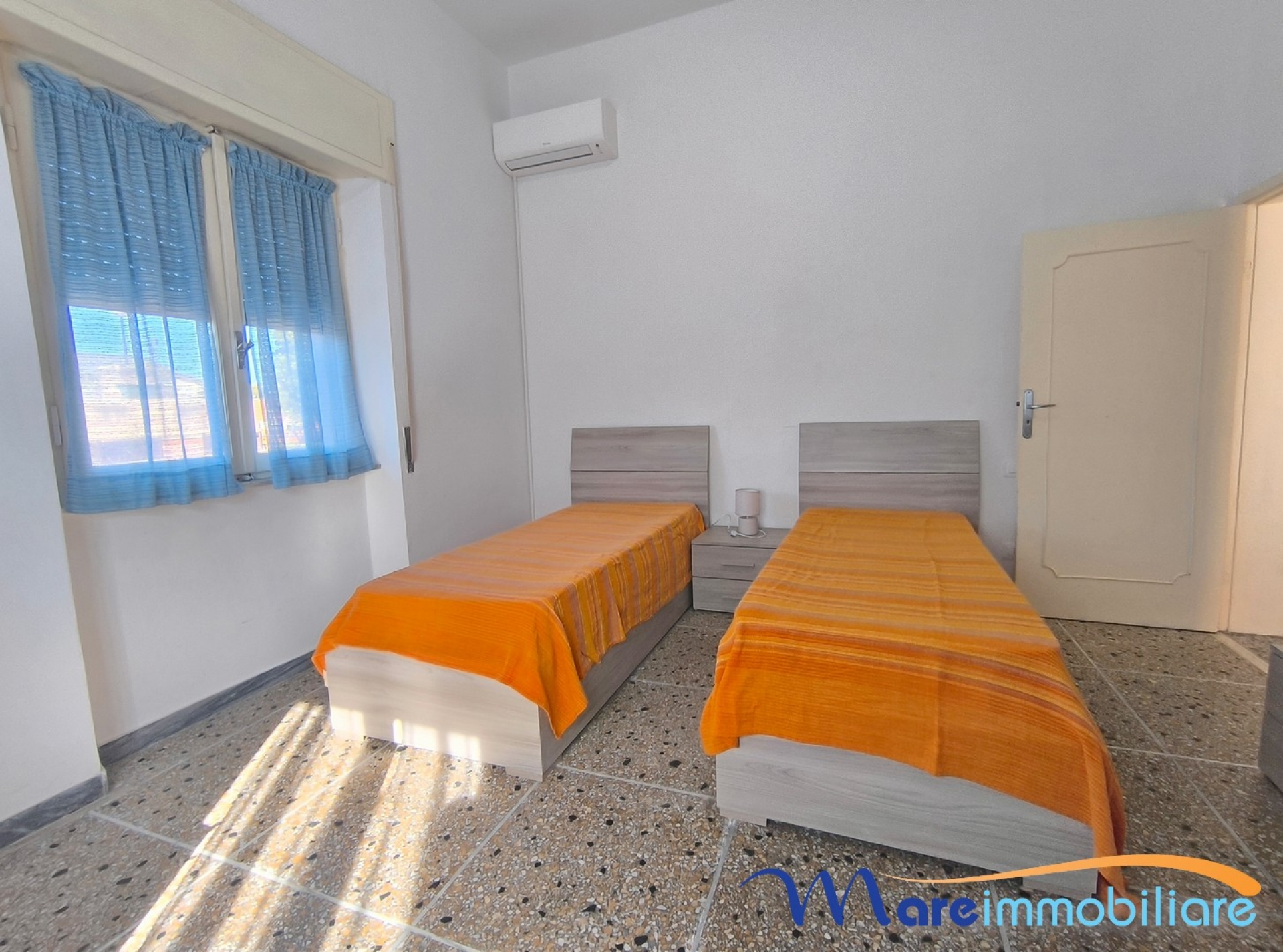 Trilocale con due camere da letto e posto auto