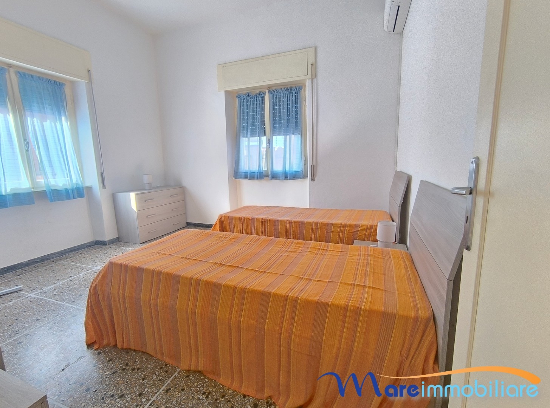 Trilocale con due camere da letto e posto auto