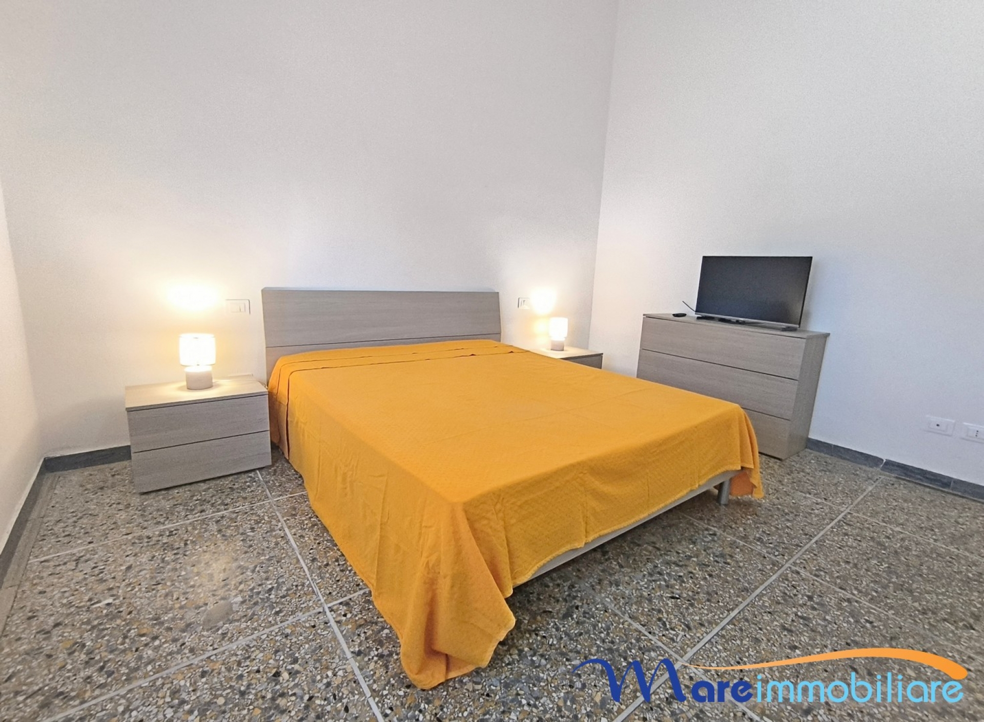 Trilocale con due camere da letto e posto auto