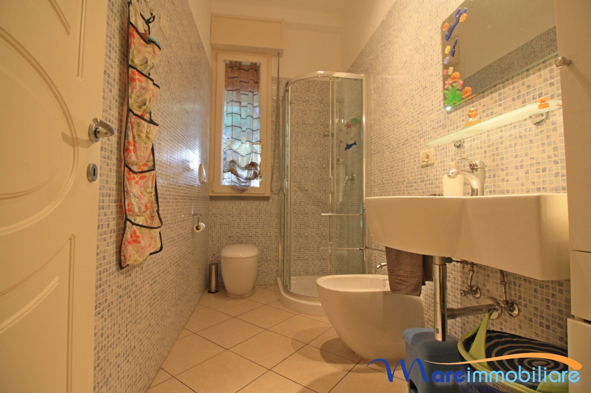 Bilocale zona Rosmarina con posto auto privato