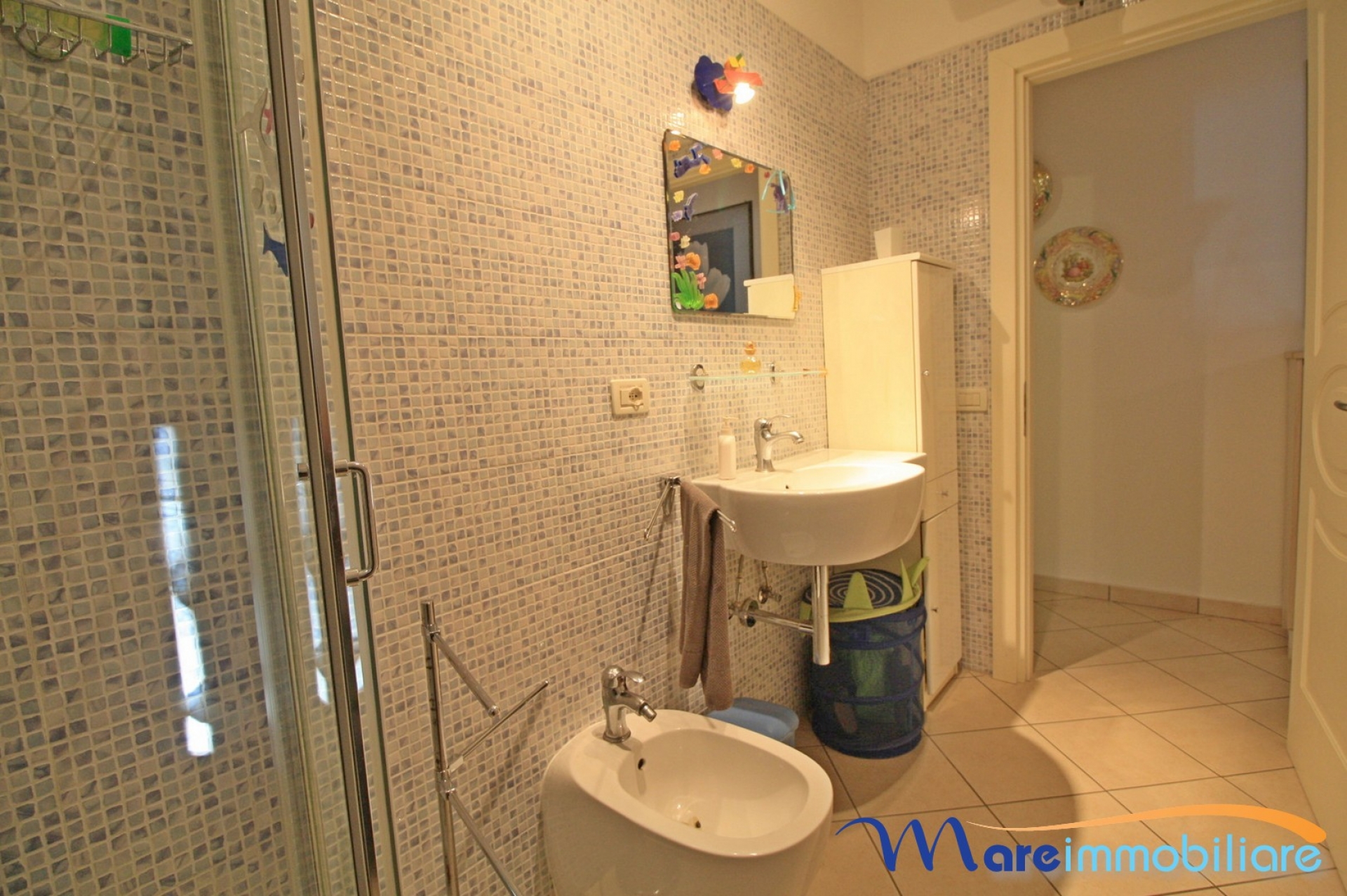 Bilocale zona Rosmarina con posto auto privato