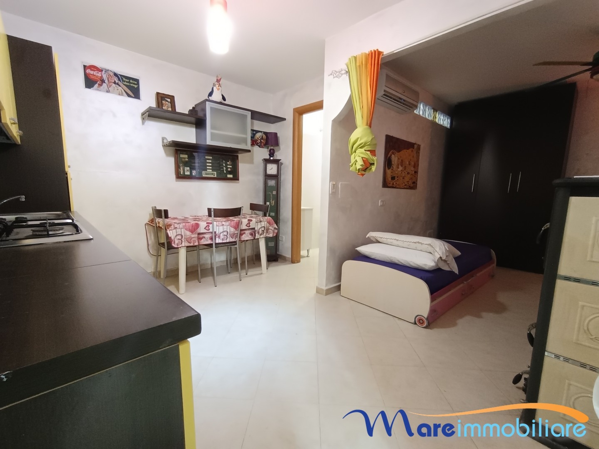 Bilocale con taverna zona sciangai